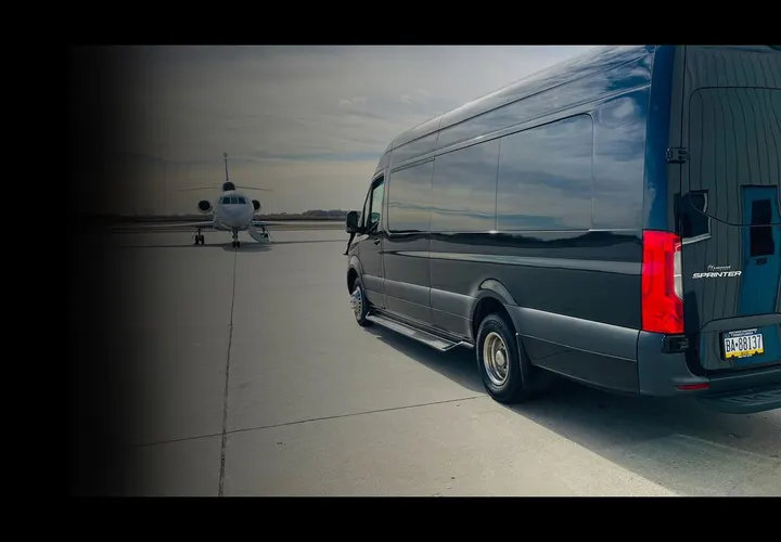 Royal Limousine Mercedes-Benz Sprinter beside a private jet on an airport tarmac